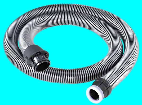 Coiled black and gray vacuum hose on a turquoise background